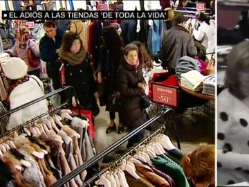 Imagen de una gran superficie y de un pequeño comercio Imagen de una gran superficie y de un pequeño comercio