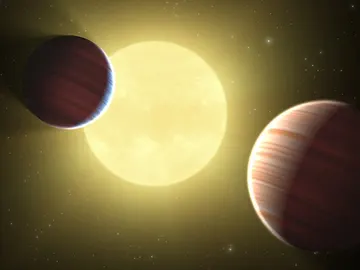 Dos planetas que orbitan alrededor de dos soles Dos planetas que orbitan alrededor de dos soles