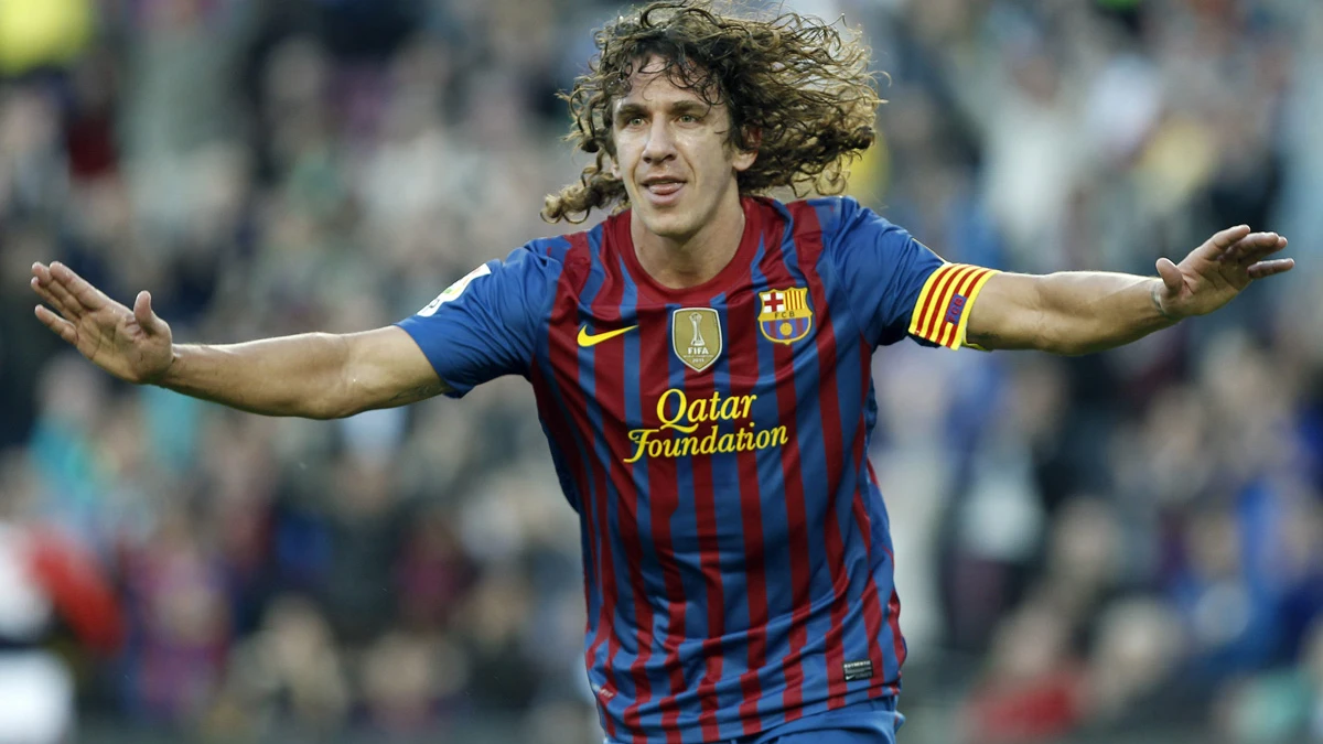 Puyol celebra un gol