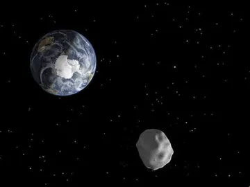 Un asteroide, muy cerca de la Tierra (archivo) Un asteroide, muy cerca de la Tierra (archivo)