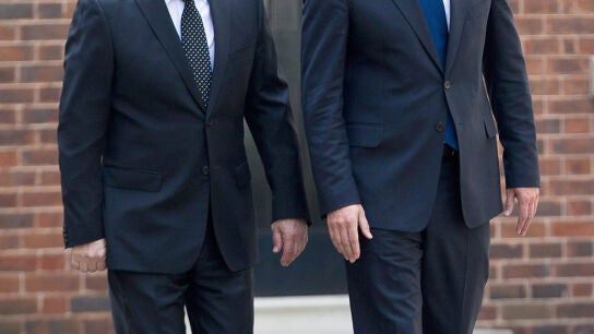 Vladimir Putin junto a David Cameron