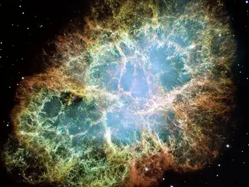 Restos de una explosión de supernova conocidos como “Nebulosa del Cangrejo” (M1) situada a 6300 años luz. Su luz llegó a la Tierra en el año 1054 de nuestra. El brillo de la explosión duró varias semanas y su brillo era comparable al de la Luna Restos de una explosión de supernova conocidos como “Nebulosa del Cangrejo” (M1) situada a 6300 años luz. Su luz llegó a la Tierra en el año 1054 de nuestra. El brillo de la explosión duró varias semanas y su brillo era comparable al de la Luna