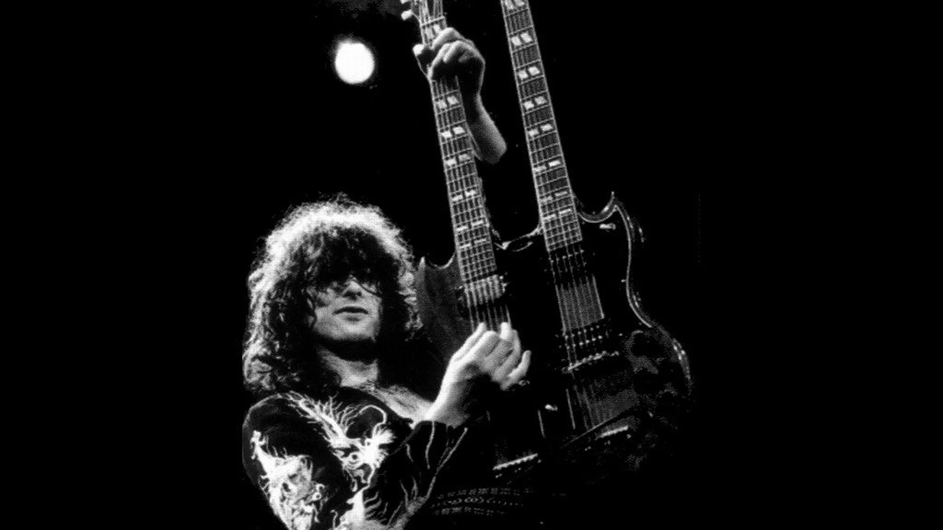 Jimmy Page con su Gibson SG de doble mástil