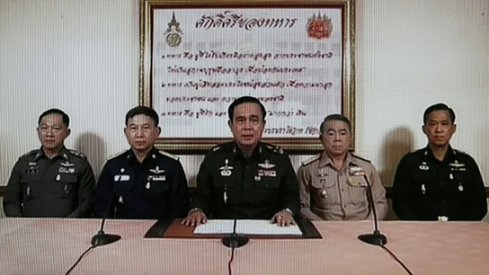 Imagen tomada de la televisión que muestra al jefe del Ejército tailandés, Prayuth Chan-Ocha (c) Imagen tomada de la televisión que muestra al jefe del Ejército tailandés, Prayuth Chan-Ocha (c)