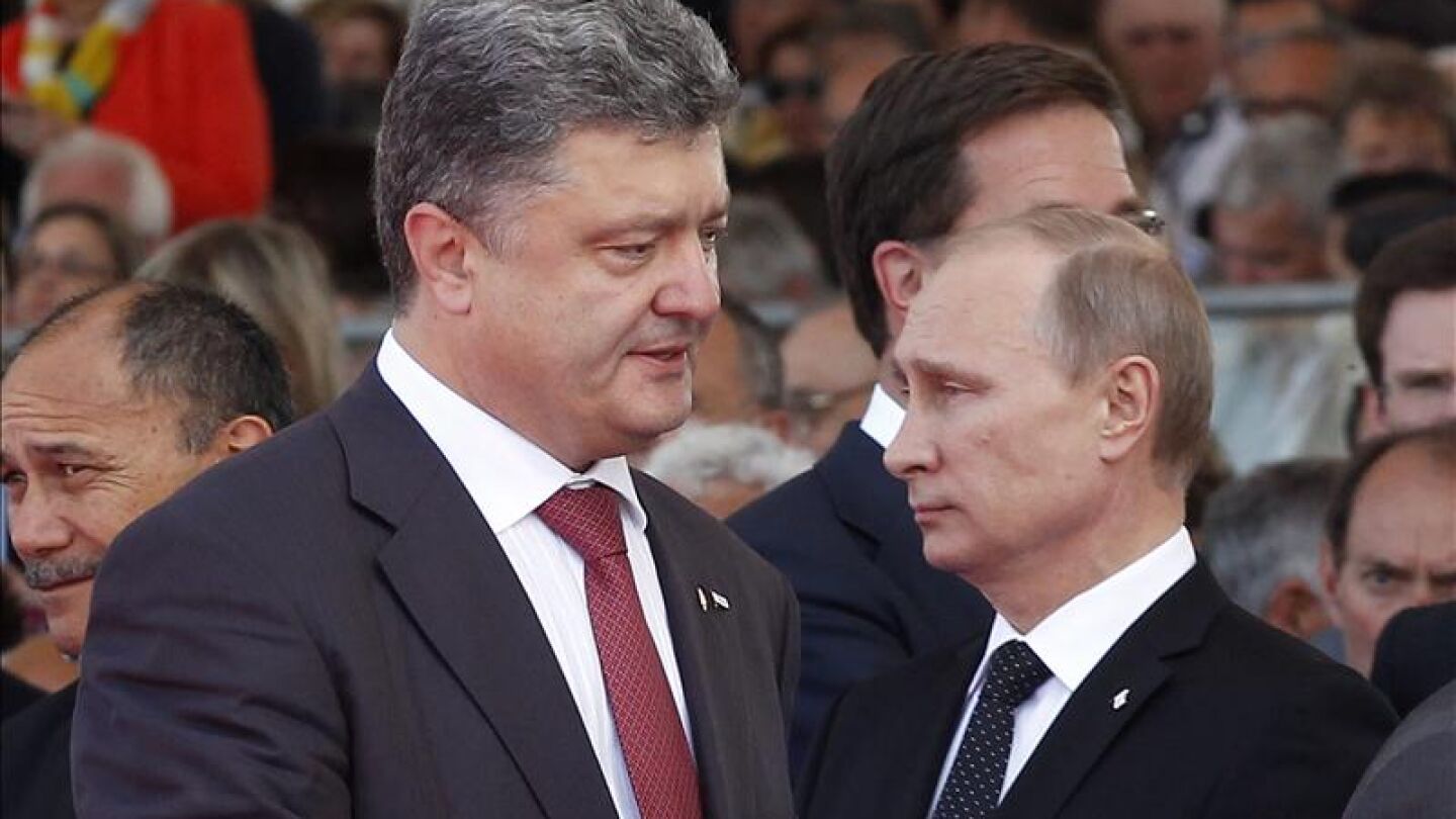 El presidente de Ucrania, Poroshenko, y Vladimir Putin