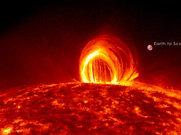 Un erupción solar comparada con el tamaño de la Tierra Un erupción solar comparada con el tamaño de la Tierra
