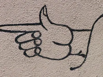 Graffiti de una mano señalando con el dedo índice Graffiti de una mano señalando con el dedo índice
