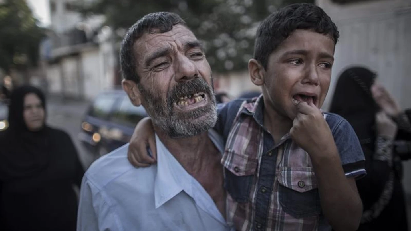 El padre y el hermano de dos de los niños asesinados El padre y el hermano de dos de los niños asesinados
