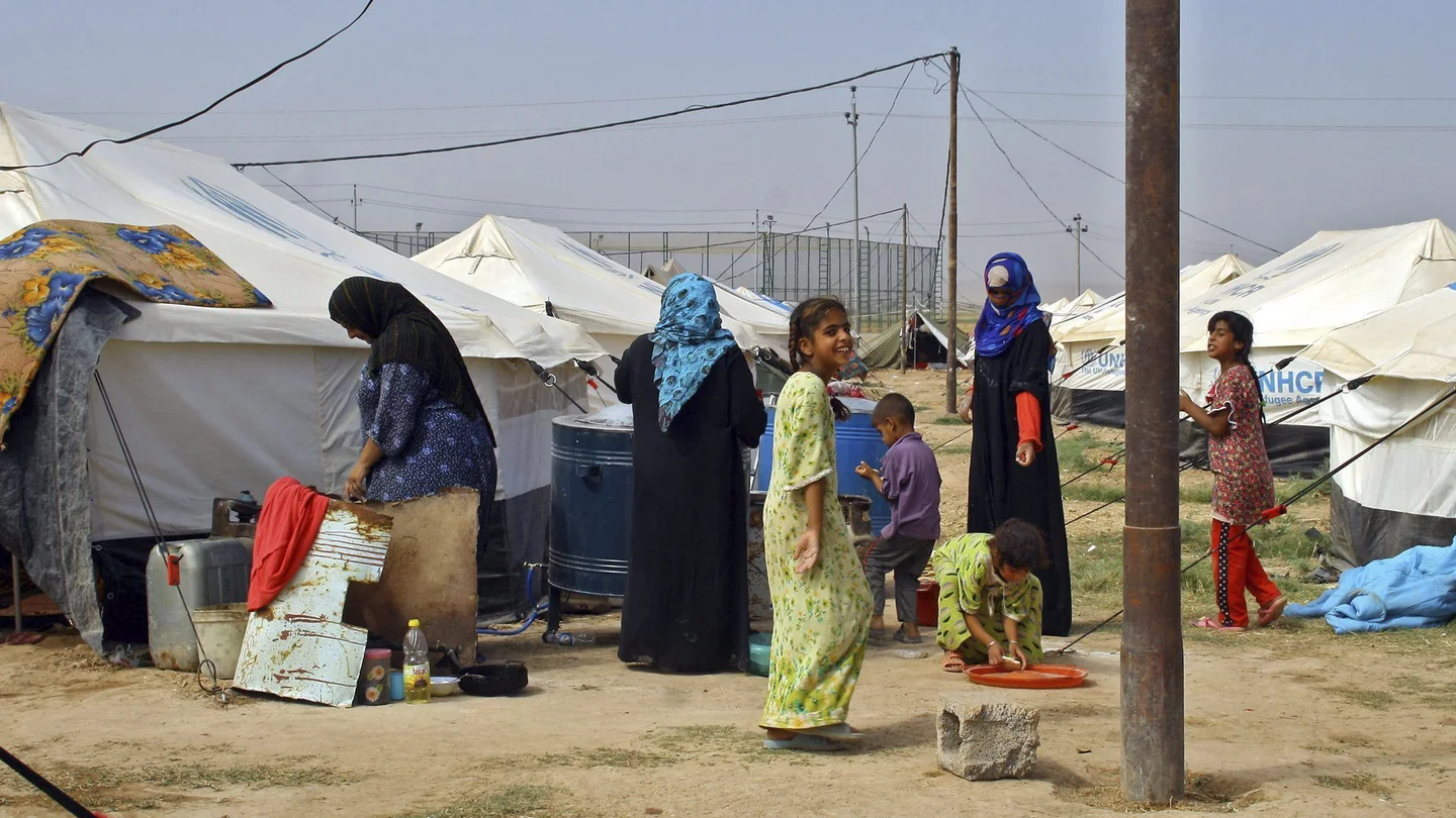 Un grupo de iraquíes, fotografiados en un campo de refugiados en la zona de Jalawla, en el este de Irak Un grupo de iraquíes, fotografiados en un campo de refugiados en la zona de Jalawla, en el este de Irak