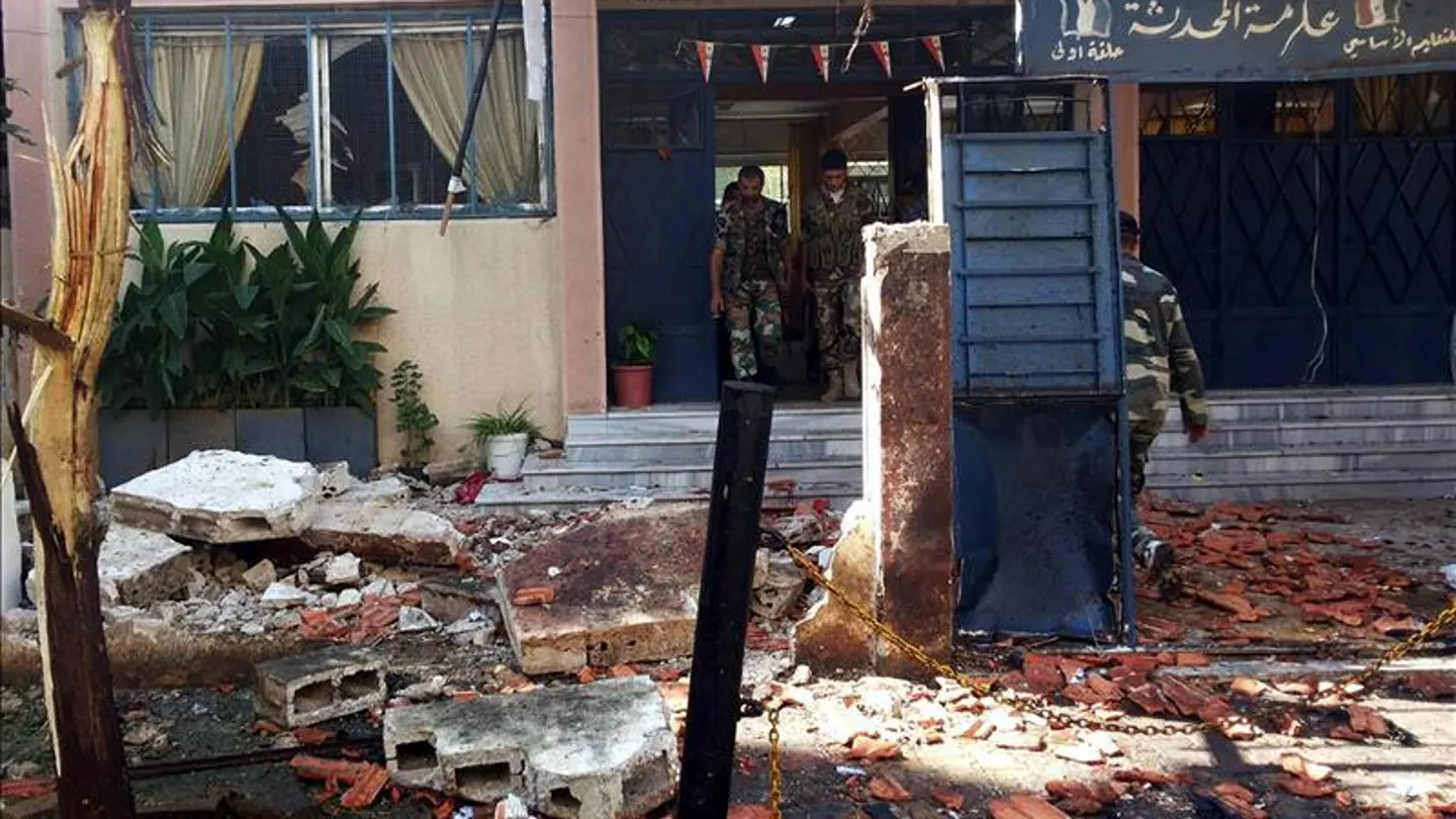 Lugar del doble atentado en Homs Lugar del doble atentado en Homs