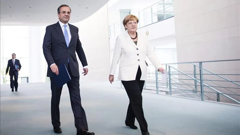 Angela Merkel junto al primer ministro griego, Antonis Samaras.