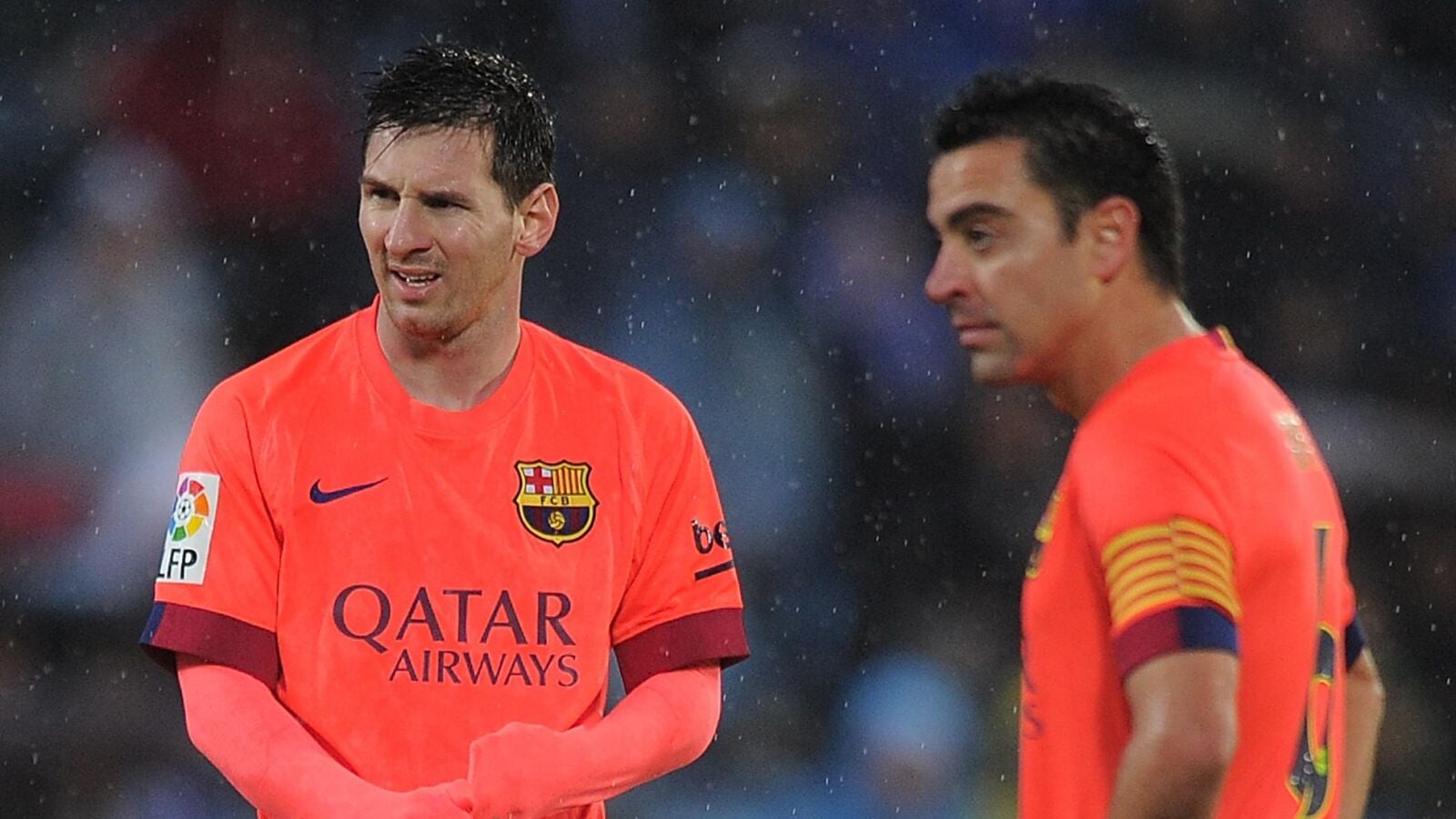 Leo Messi, junto a Xavi Hern&aacute;ndez