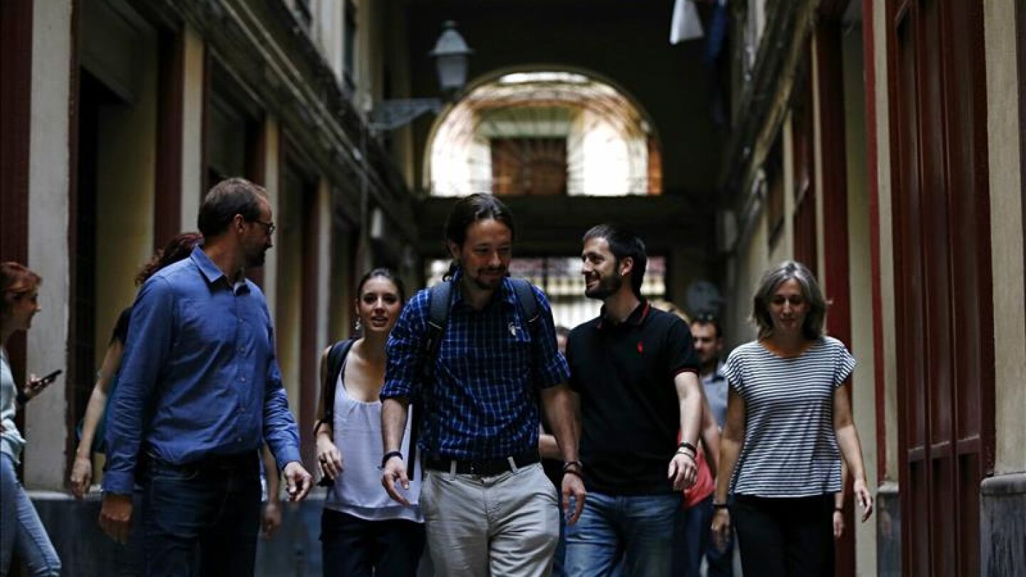 El secretario general de Podemos, Pablo Iglesias, y los coordinadores nacionales de ICV Joan Herrera y Dolors Camats.