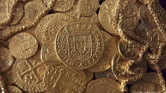 Monedas y cadena de oro halladas en el barco español Monedas y cadena de oro halladas en el barco español