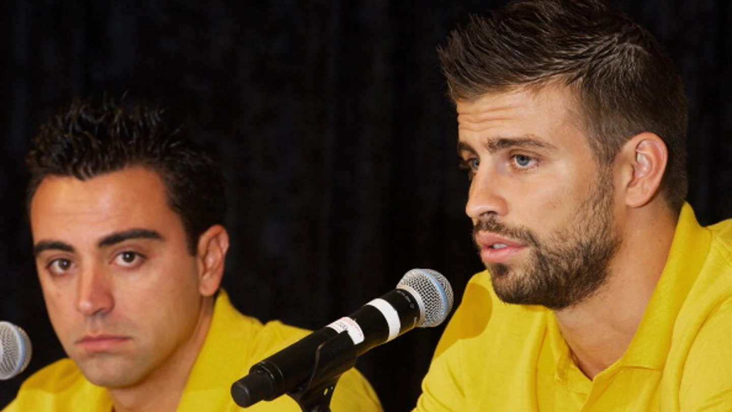 Xavi y Piqué Xavi y Piqué