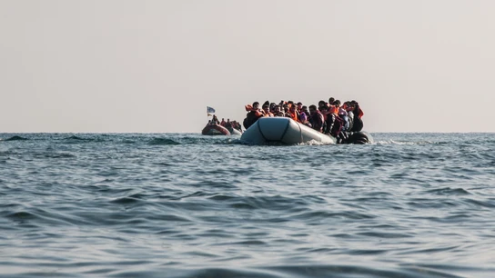 Refugiados llegando a la costa Refugiados llegando a la costa