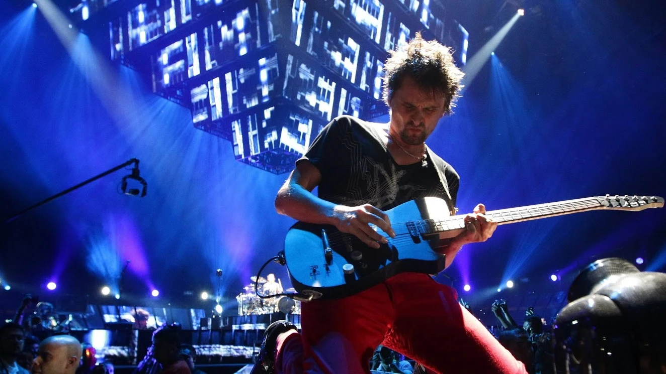 Imagen de la banda Muse en un concierto Imagen de la banda Muse en un concierto