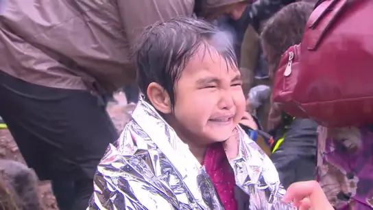 Un niña refugiada, en la isla de Lesbos Un niña refugiada, en la isla de Lesbos