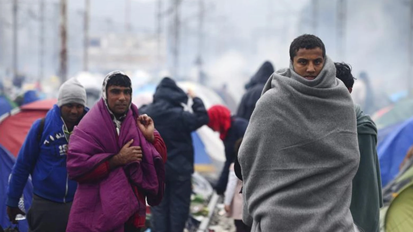 Varios refugiados en la frontera entre Grecia y Macedonia Varios refugiados en la frontera entre Grecia y Macedonia