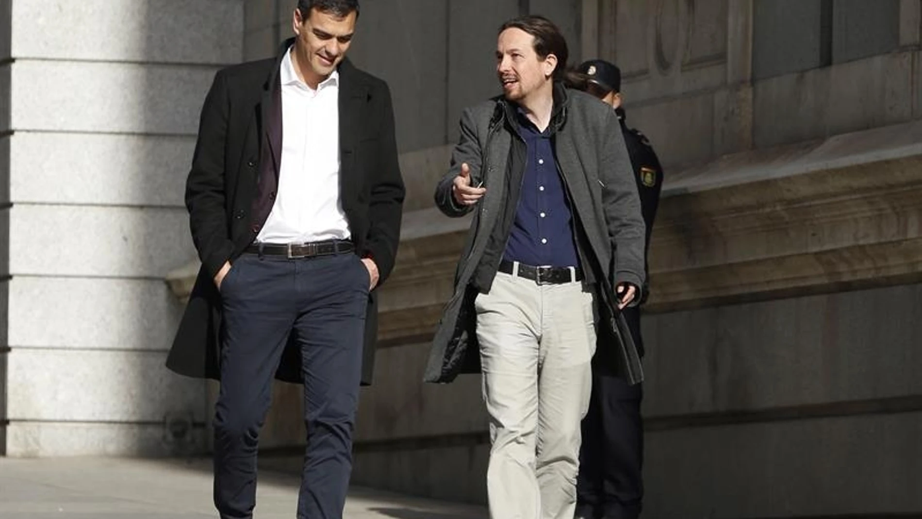 Pedro Sánchez y Pablo Iglesias a su llegada al Congreso