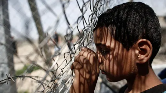 Un niño refugiado, en el campamento de Idomeni Un niño refugiado, en el campamento de Idomeni
