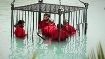 Los rehenes ejecutados por Daesh en una jaula