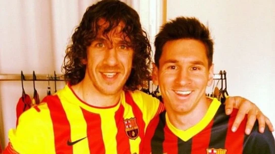 Carles Puyol junto a Leo Messi Carles Puyol junto a Leo Messi
