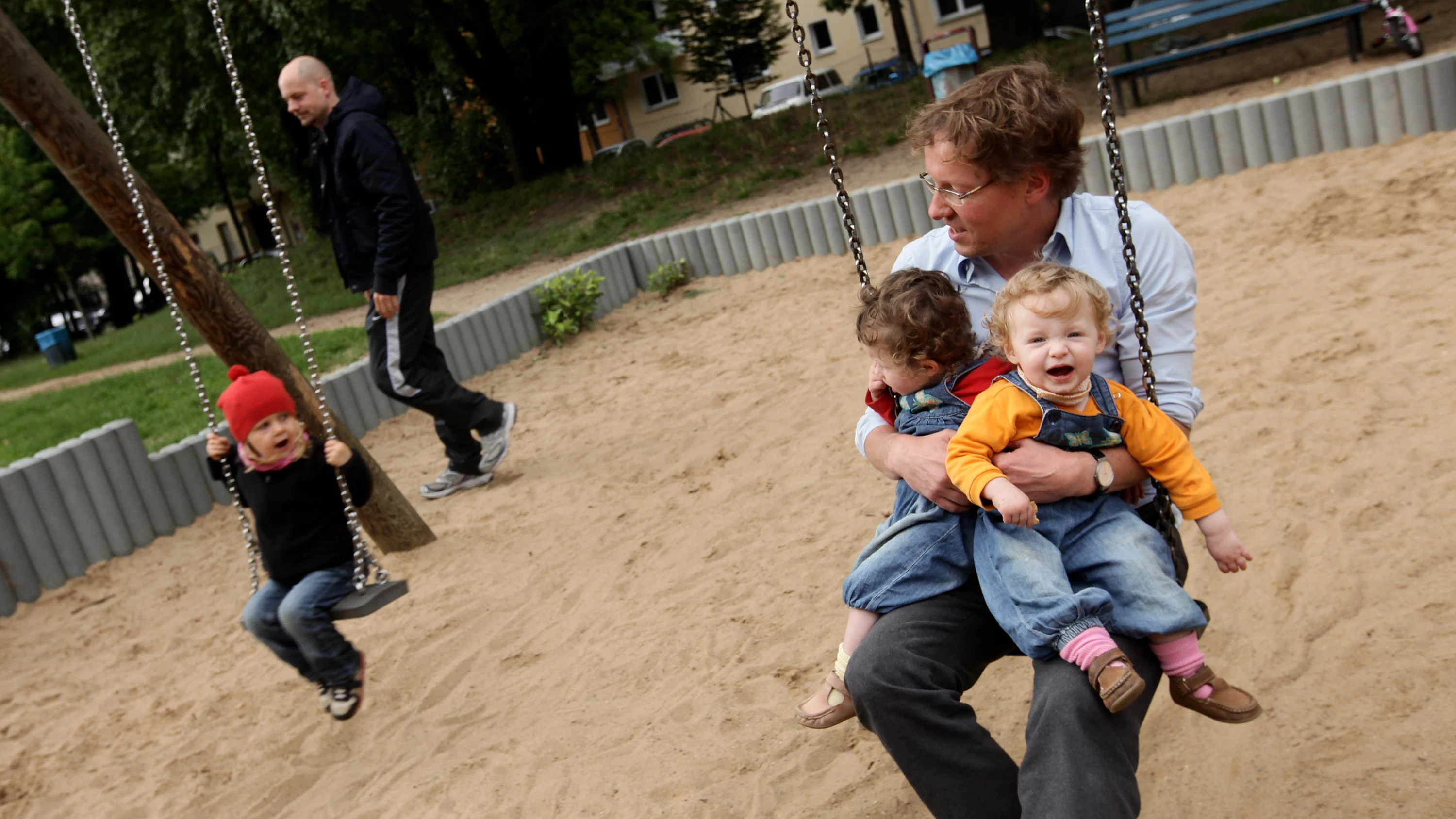 Padre con sus hijos