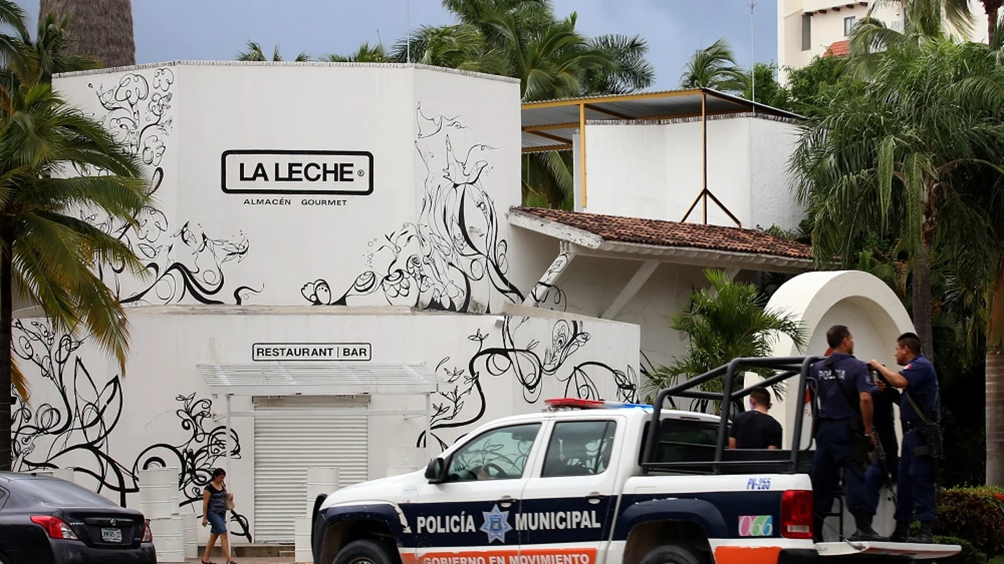 Fotografía del restaurante La Leche vigilado por la policía Fotografía del restaurante La Leche vigilado por la policía