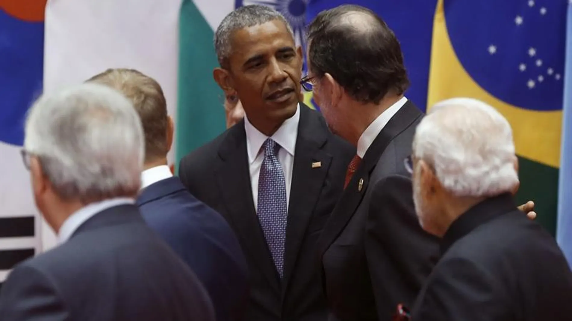 Momento en el que Rajoy y Obama se saludan durante la cumbre del G20