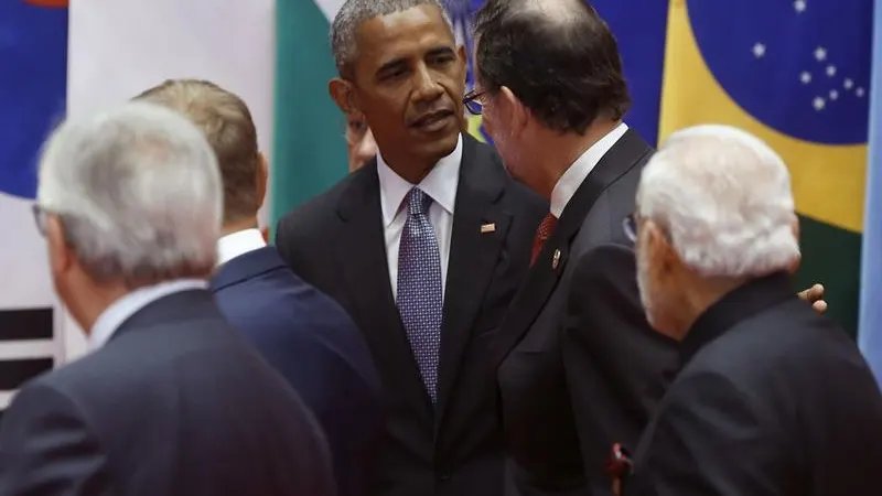 Momento en el que Rajoy y Obama se saludan durante la cumbre del G20