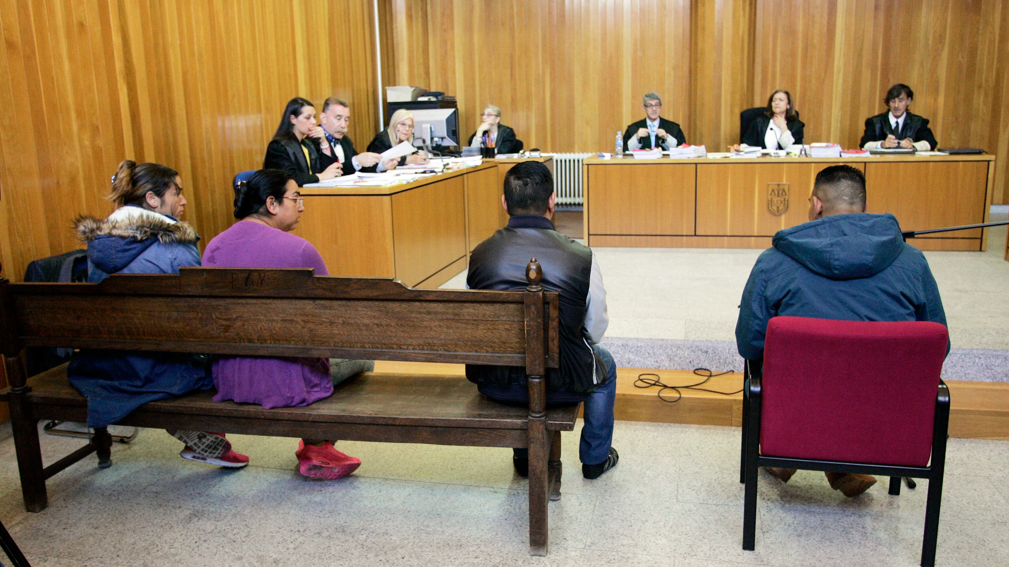 Los cuatro acusados durante el juicio.