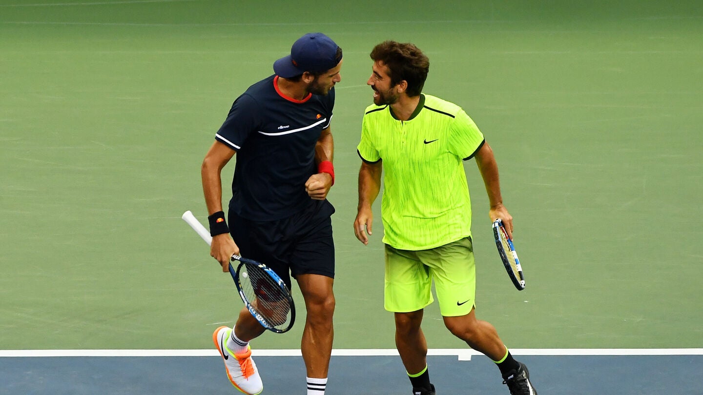 Feliciano L&oacute;pez junto a Marc L&oacute;pez en el Abierto de Estados Unidos