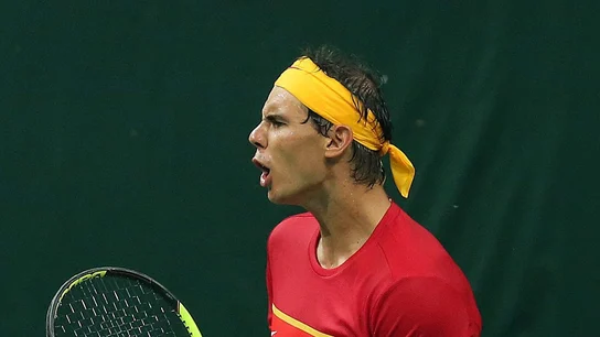 Nadal celebra un punto en el partido de dobles Nadal celebra un punto en el partido de dobles