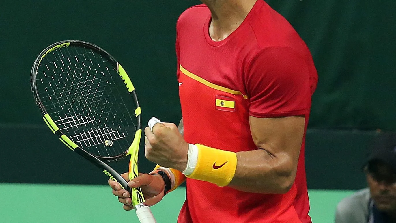 Nadal celebra un punto en el partido de dobles