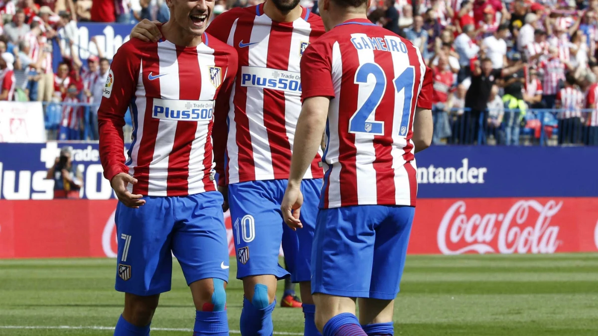 Gameiro, Griezmann y Carrasco celebran un gol