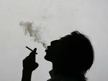 Una fumadora Una fumadora