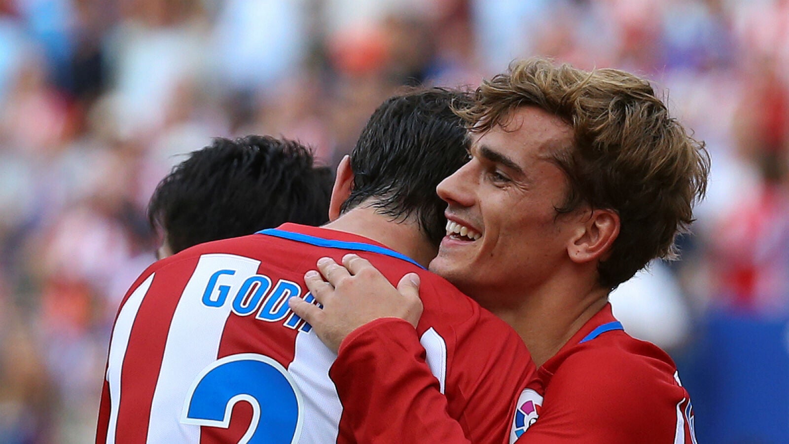 God&iacute;n se abraza a Griezmann