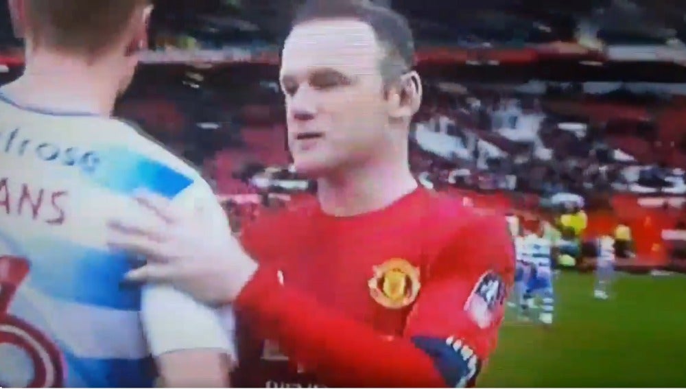 Rooney y George Evans al terminar el partido