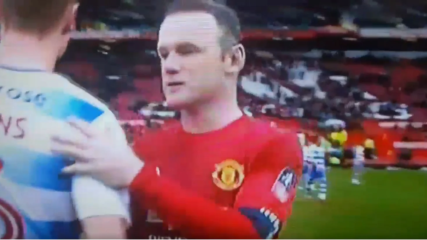 Rooney y George Evans al terminar el partido Rooney y George Evans al terminar el partido