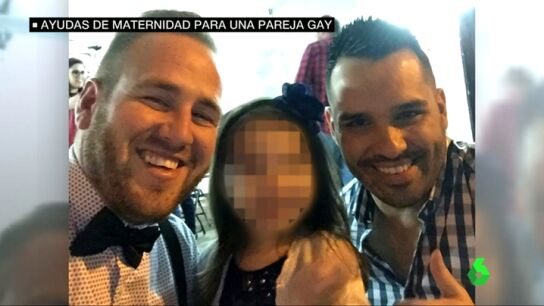 David y Javier junto a su hija