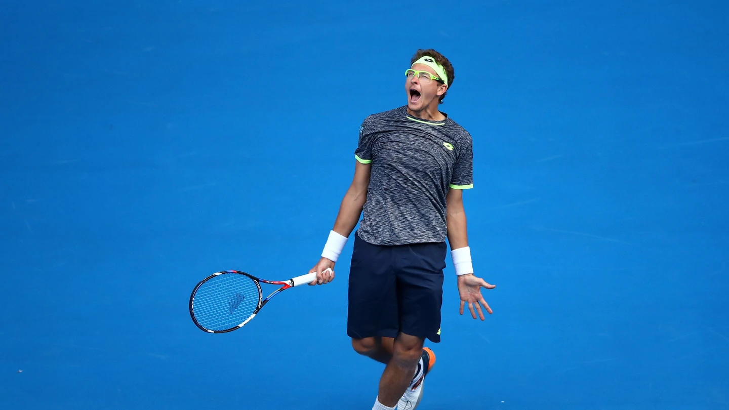 Denis Istomin celebra su victoria sobre Novak Djokovic Denis Istomin celebra su victoria sobre Novak Djokovic