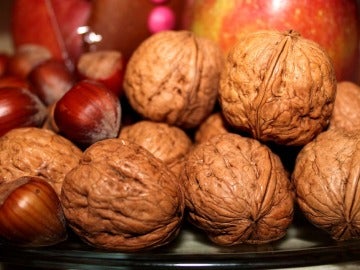 Imagen de archivo de nueces y castañas Imagen de archivo de nueces y castañas