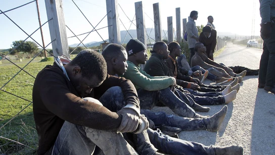 Imagen de archivo de un grupo de migrantes Imagen de archivo de un grupo de migrantes