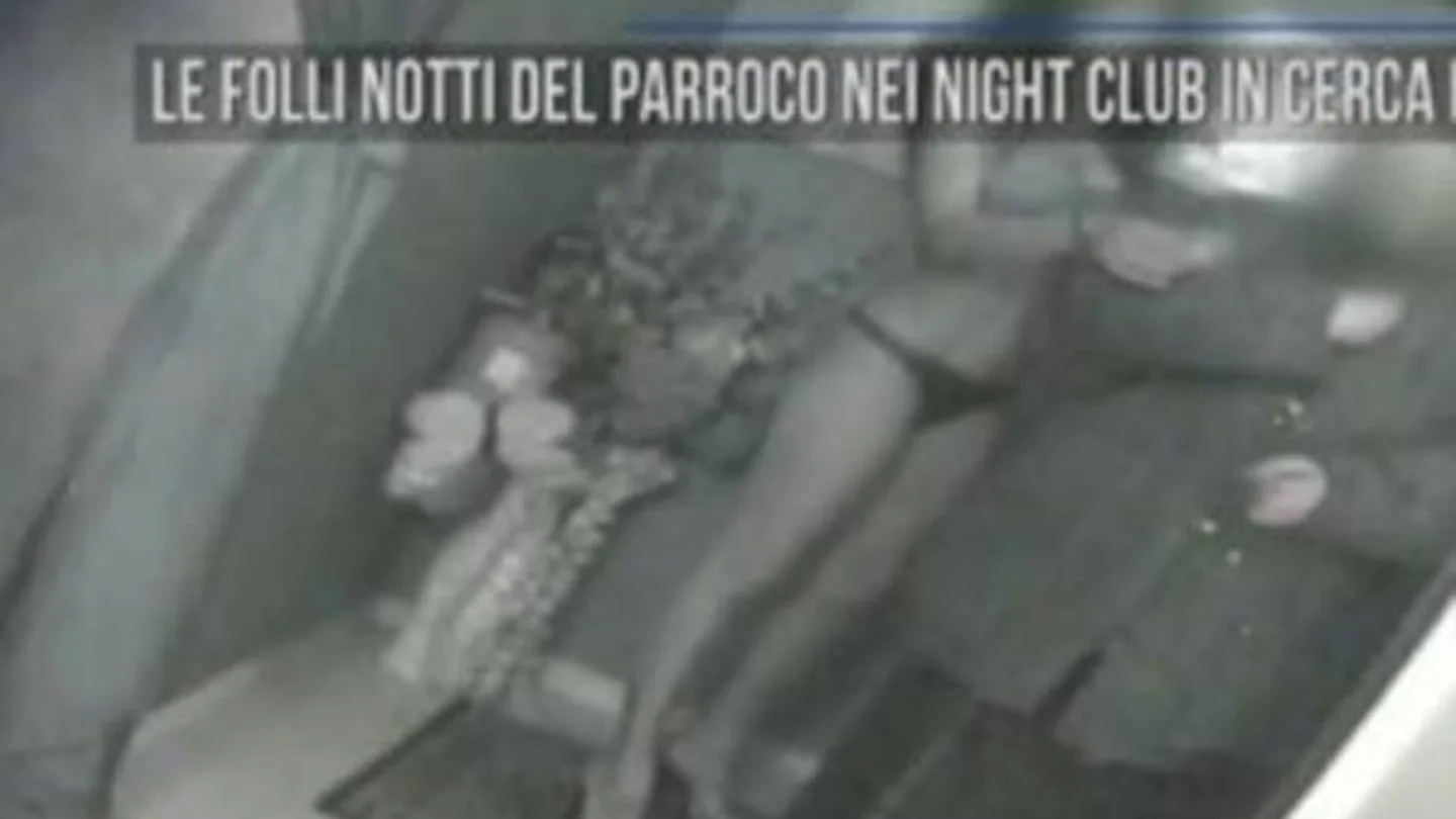 Imagen del sacerdote con una prostituta Imagen del sacerdote con una prostituta