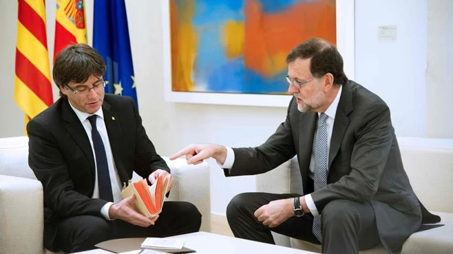 Mariano Rajoy y Carles Puigdemont