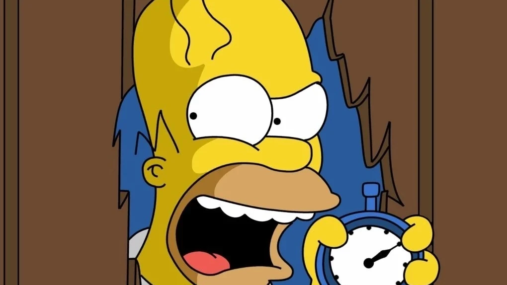 Hommer Simpson recreando una escena de 'El Resplandor' Hommer Simpson recreando una escena de 'El Resplandor'