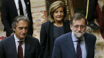 Mariano Rajoy, presidente del gobierno, junto a Íñigo de la Serna y Fátima Báñez