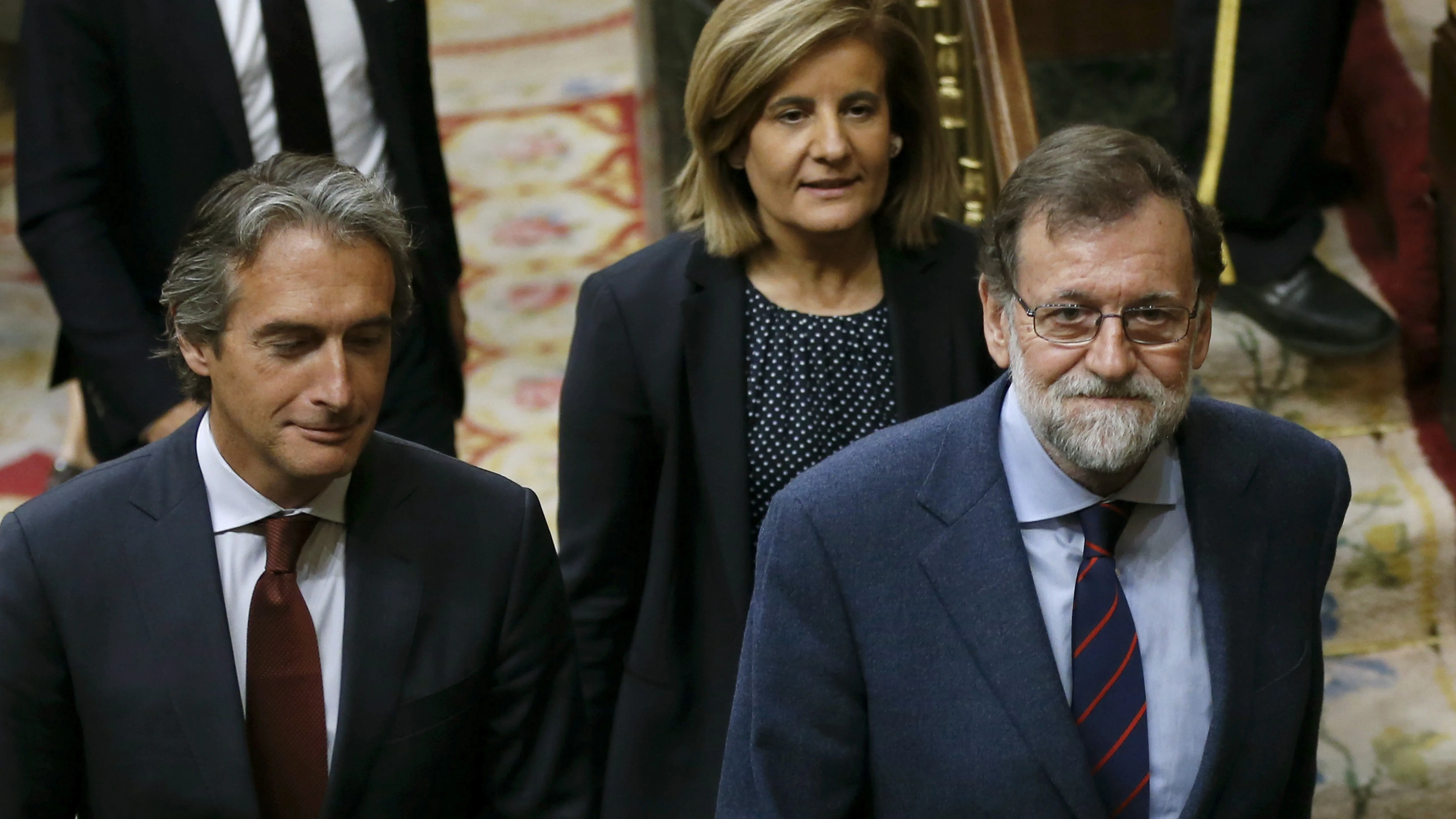 Mariano Rajoy, presidente del gobierno, junto a Íñigo de la Serna y Fátima Báñez