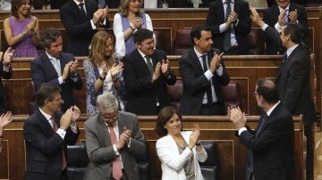 El presidente del Gobierno, Mariano Rajoy, sus ministros y los diputados del PP